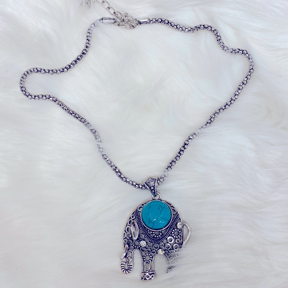 Elephant pendant necklace designed with antique concept. Silver overlay